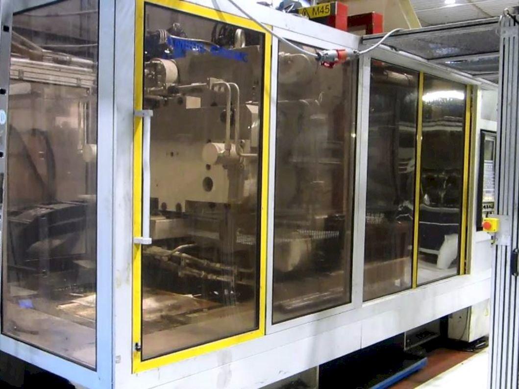 Front view of Krauss Maffei KM 800/5700 MC  machine