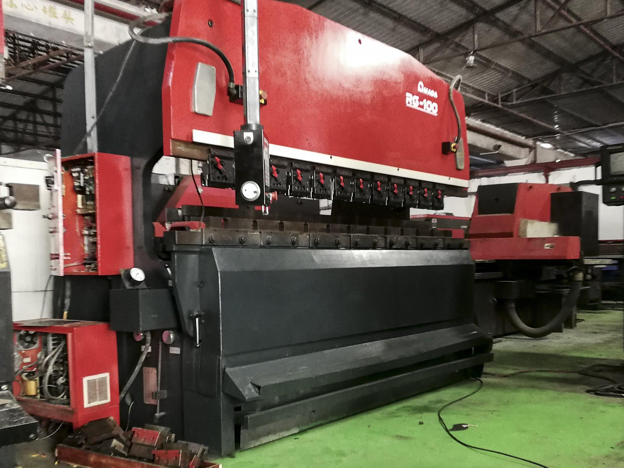 Left view of AMADA RG-100 Machine