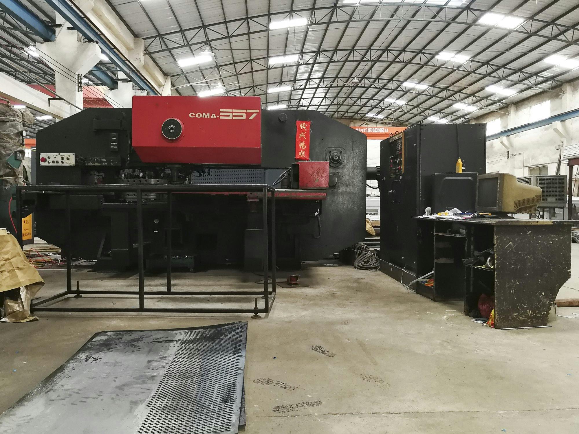 Front view of AMADA Coma 557 machine